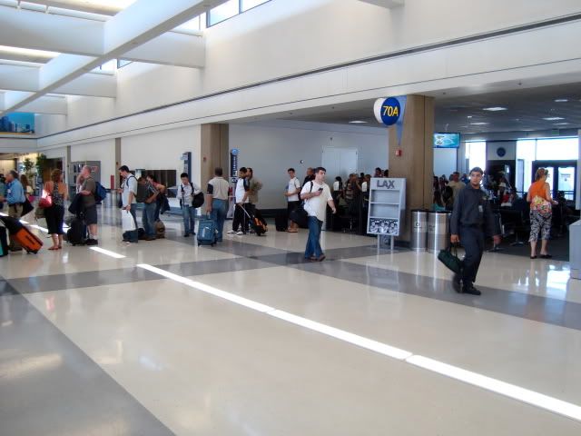 a group of people in an airport