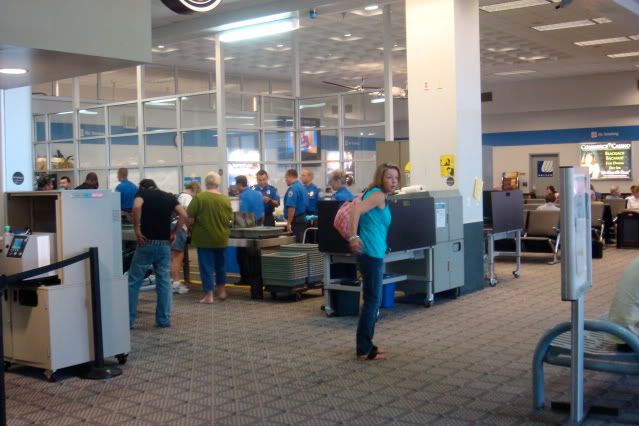 a group of people in an airport