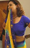Bhavana hot boobs projecting out during a film makeup , she is changing her saree high quality wallpaper with a blouse exposing her navel and cleavage